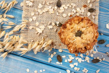 Yulaf ezmeli Kurabiye Pişirme ve yulaf, sağlıklı tatlı kavramı kulakları için malzemeler ile