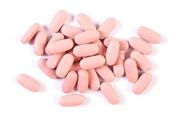 Tıbbi tabletler ve kapsüller beyaz arka planda, sağlık kavramı — Stok fotoğraf