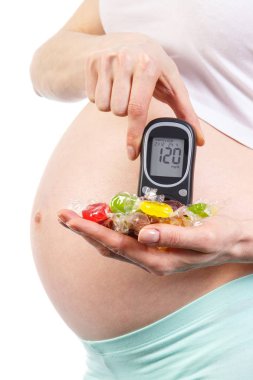 Şeker Ölçüm ve renkli şekerler, diyabet ve gebelik sırasında sağlıklı beslenme ile hamile kadın