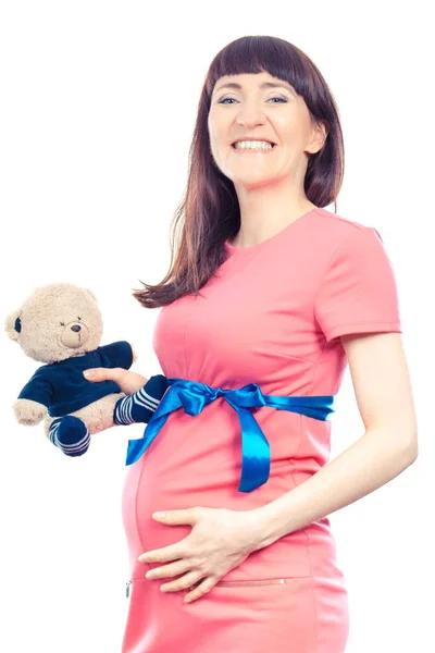 Vintage foto, donna incinta in abito in possesso di peluche orsacchiotto per bambini, in attesa per il concetto di neonato — Foto Stock