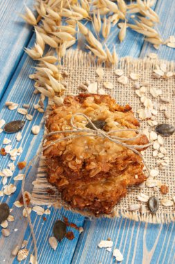 Yulaf ezmeli Kurabiye Pişirme ve yulaf, sağlıklı tatlı kavramı kulakları için malzemeler ile