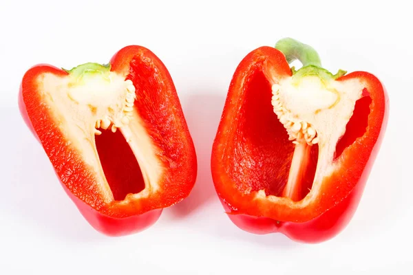 Fresh red peppers lying on white background, healthy nutrition concept — Stock Photo, Image