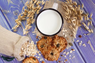 Yulaf ezmeli Kurabiye Pişirme ve yulaf, sağlıklı tatlı kavramı kulakları için malzemeler ile