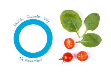 Dünya Diyabet Günü ve beyaz arka plan üzerinde sebze sembolü