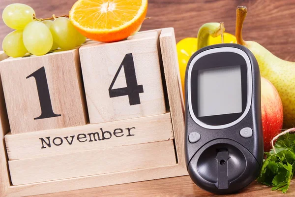 Fecha del 14 de noviembre, glucosímetro y frutas con verduras, concepto del día mundial de la diabetes —  Fotos de Stock