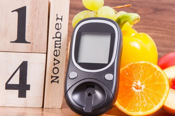 Datum 14. November, Glukometer zur Kontrolle von Zuckergehalt und Obst mit Gemüse, Welt-Diabetes-Tag und Krankheitsbekämpfungskonzept — Stockfoto