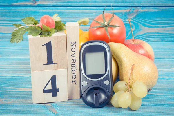 Data del 14 novembre, glucometro e frutta fresca con verdure, concetto della giornata mondiale del diabete — Foto Stock