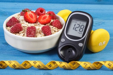 Şeker seviyesi, yulaf ezmesi meyve, santimetre ve halter, diyabet ve sağlıklı yaşam kontrol etmek için şeker ölçüm