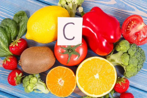 Fruits and vegetables as sources vitamin C, concept of strengthening immunity and healthy eating — Stock Photo, Image