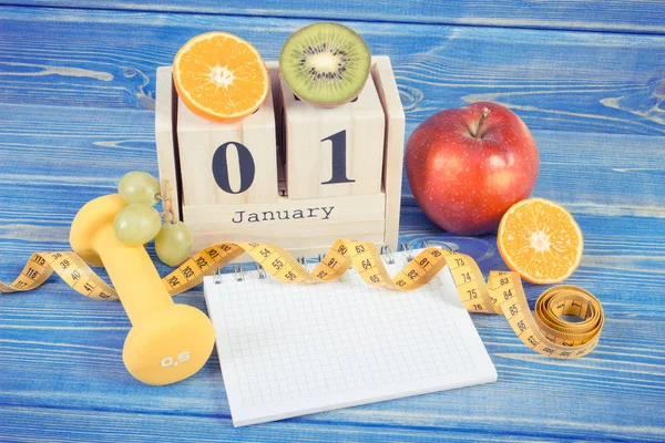 Vintage photo, Date of 1 January, fruits, dumbbells and tape measure, new years resolutions — Stock Photo, Image