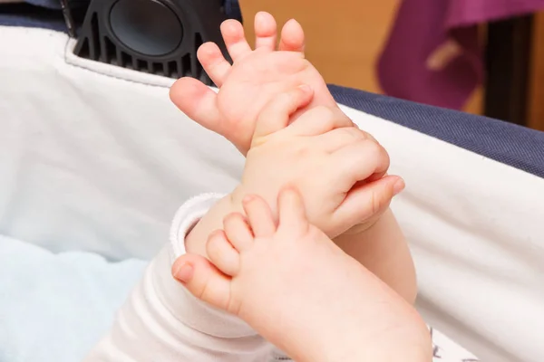 Tiny hand and foots of newborn baby
