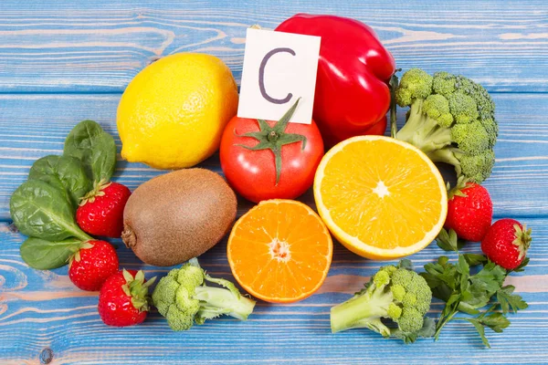 Fruits and vegetables as sources vitamin C, concept of strengthening immunity and healthy eating — Stock Photo, Image