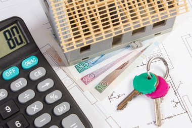 Evin altında inşaat, tuşları, hesap makinesi ve Polonya para birimi para elektrik diyagramları