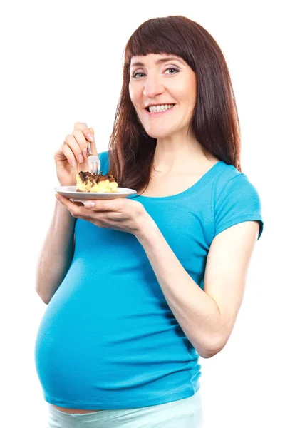 Woman in pregnant eating fresh cheesecake, concept of nutrition during pregnancy — Stock Photo, Image