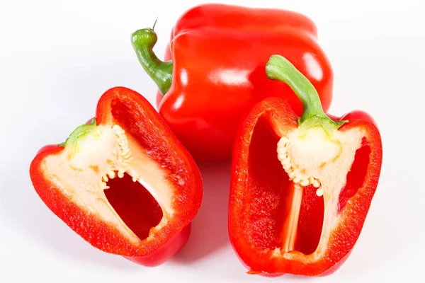 Heap of red ripe peppers on white background, healthy nutrition — Stock Photo, Image