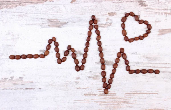 Cardiogram lijn van koffie korrels, geneeskunde en gezondheidszorg concept — Stockfoto