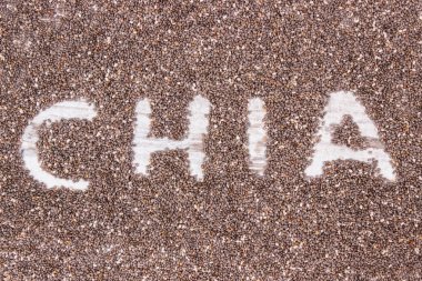 Yazıt chia ve kaynak doğal vitaminler, diyet lifi ve mineraller, sağlıklı beslenme kavramı olarak tohum