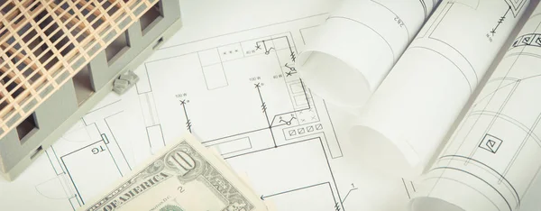 Diagrammi elettrici, casa in costruzione e valute dollaro, costruzione concetto di costo di casa — Foto Stock