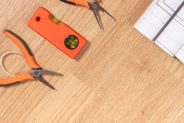 Electrical drawings or diagrams, orange work tools for use in engineer jobs