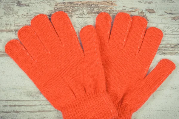 Red gloves for woman made of cotton or wool, clothing for autumn or winter concept — Stock Photo, Image