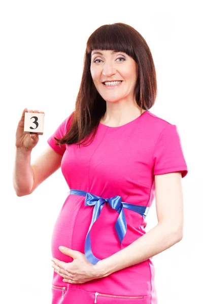 妊娠中の女性妊娠、新生児用を期待しての概念の 3 番目の月の数を示す — ストック写真