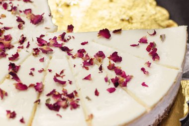 Fresh prepared cheesecake on plate. Delicious dessert