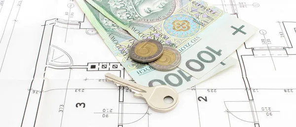 Disegni elettrici della costruzione con il denaro polacco e la chiave domestica, concetto di costo della casa di costruzione — Foto Stock