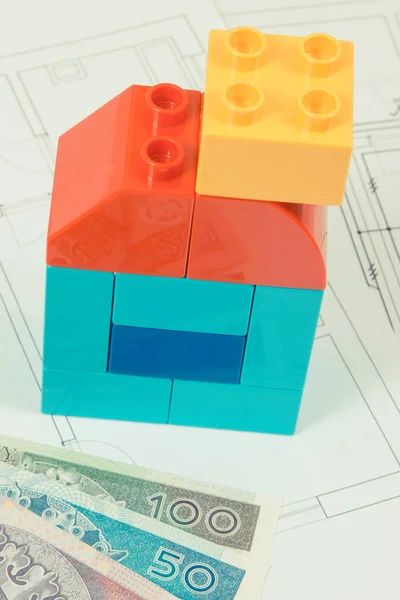 Colorful Plastic Toy Blocks Polish Banknote Construction Drawings House Concept — Stock Photo, Image