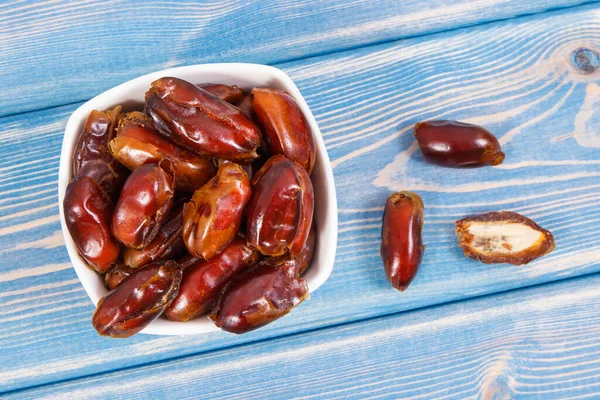 Dates as source vitamins, dietary fiber and natural minerals, concept of healthy lifestyle and nutrition