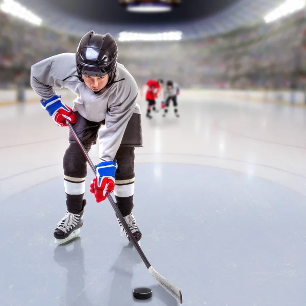 Junior Hockey Player Puck Handling in Arena