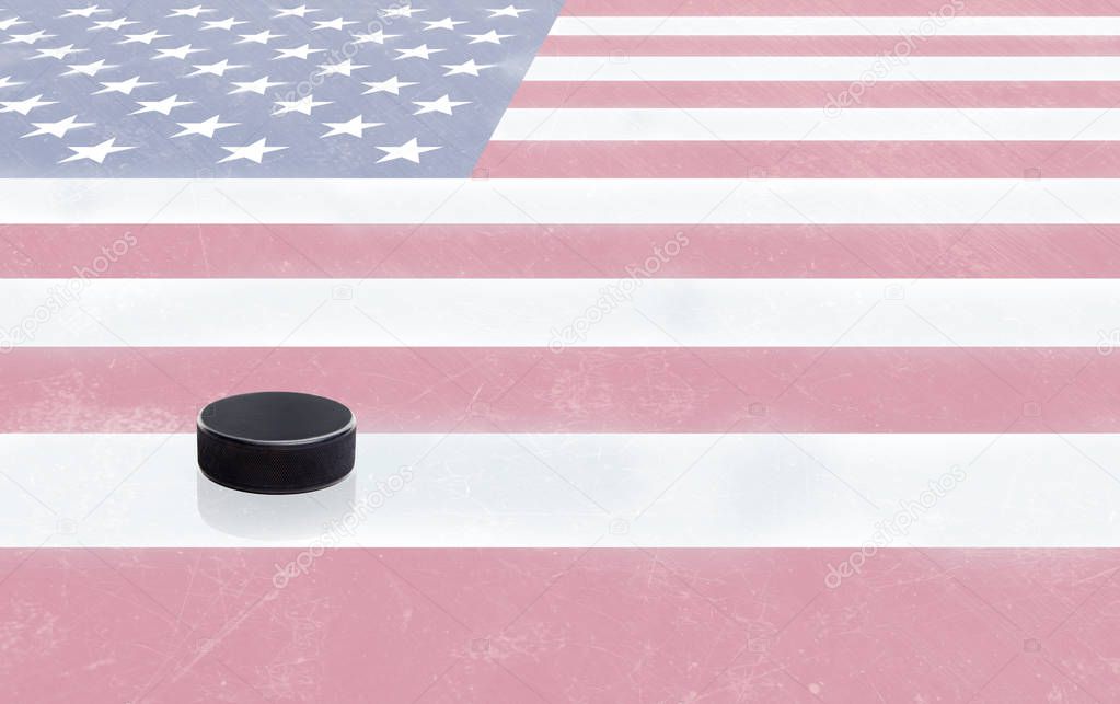 Hockey Puck and USA Flag on Ice With Copy Space
