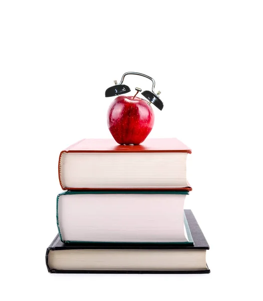 Regreso a la escuela: Apple Alarm Clock on Stack of Books — Foto de Stock