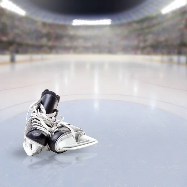 Hockey Skates on Ice of Crowded Arena — Stock Photo, Image