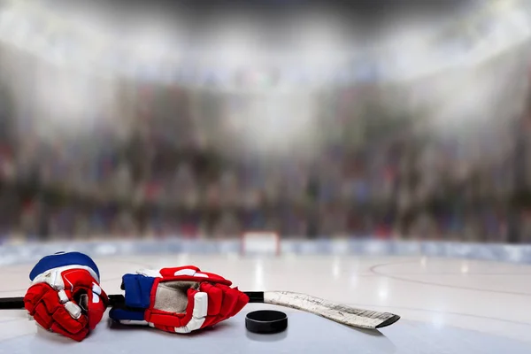 Ice Hockey Gloves, Stick and Puck in Rink — Stock Photo, Image