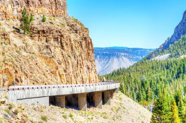 Grand Loop Road through Golden Gate Canyon of Yellowstone Nation clipart