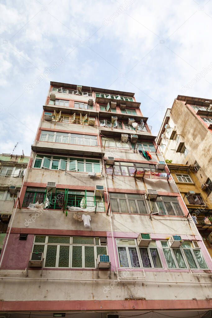 Old, crowded and dilapidated residential building typical in Sham Shui Po, Hong Kong, where it has historically been home to poorer immigrants from mainland China.