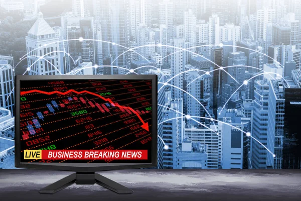 Live business breaking news update on TV screen with stock and financial indicators showing economic downturn or recession and modern city background. Concept of major event like Covid-19 pandemic driving market down.
