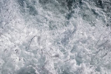 Deniz köpüğü arkaplanlı soyut çarpışma dalgaları