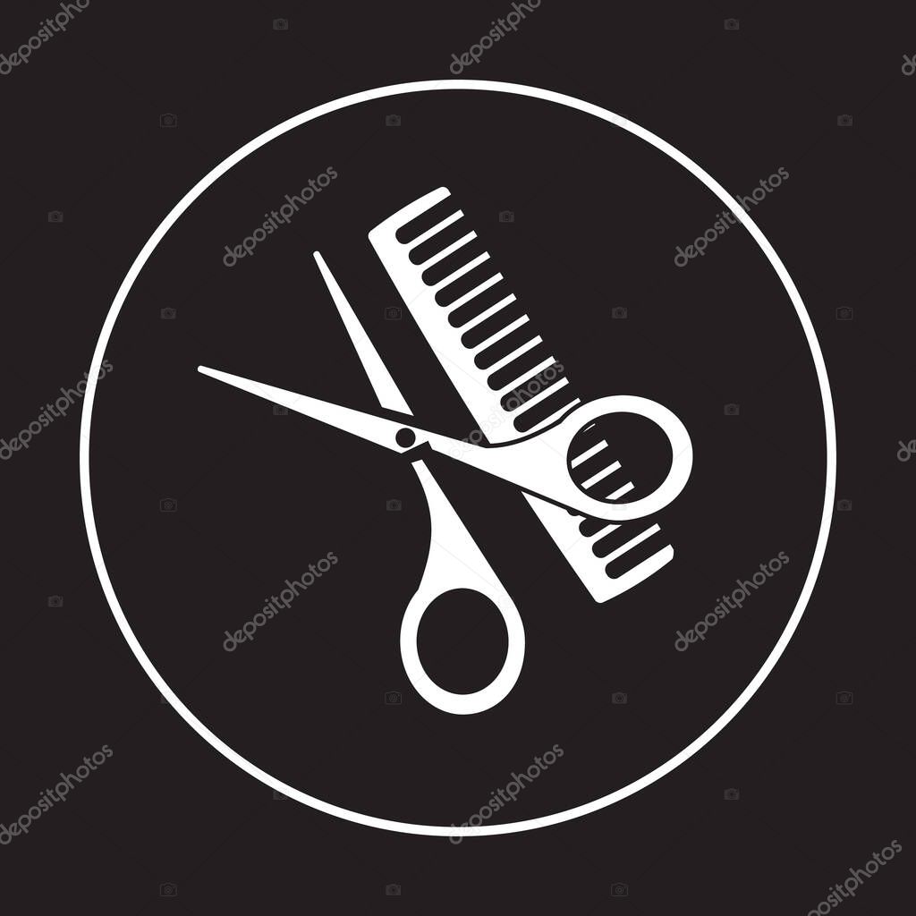 Scissors and comb on a white background