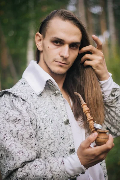 Sexy Long Haired Man Pipe His Hands Woods Beautiful Ancient — Stock Photo, Image