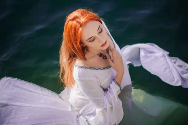 Beautiful Red Haired Girl Floating Water Rocky Coast Model Emerald — Stock Photo, Image