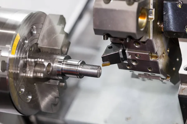 Machining automotive part by cnc turning machine — Stock Photo, Image