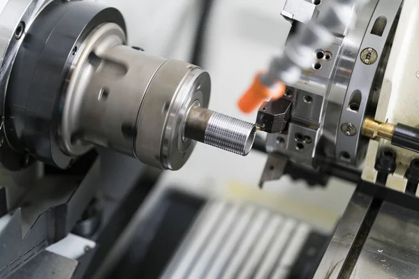 Machining automotive part by cnc turning machine — Stock Photo, Image