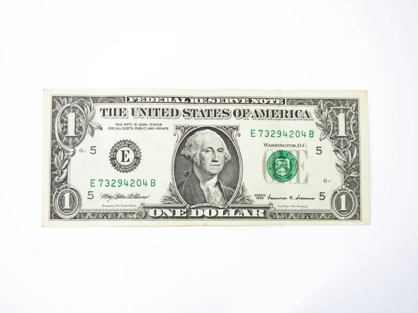 Beyaz arkaplanda bir dolara yakın izole et. — Stok fotoğraf