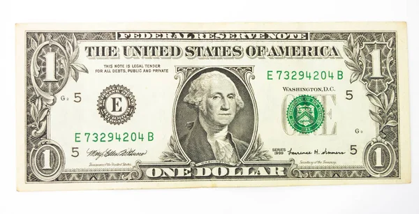 Close-up van een dollar isolaat op witte achtergrond. — Stockfoto