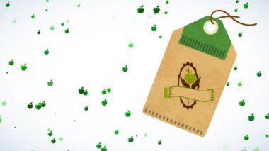 Y ekseni etrafında dönen elementler taze eksen Eko, işaretli karton etiketi çevreleyen madalyalı hareketle süslenmiş bir elmayı tutuyor.