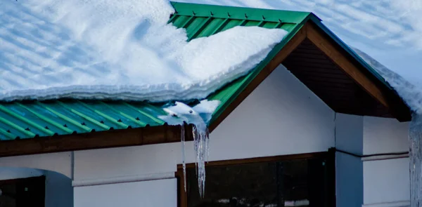 Ice dams with a cold roof at Patnitop Jammu India, Winter landscape