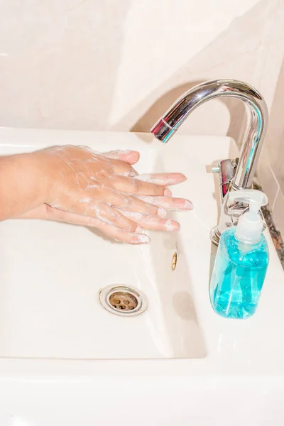 Hand Hygiene - Corona virus prevention, Cleaning Hands with Hand washing Soap. Protection by washing hands frequently