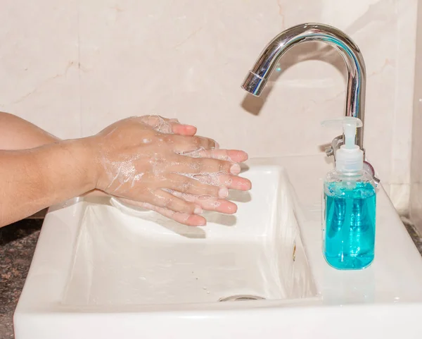 Hand Hygiene - Corona virus prevention, Cleaning Hands with Hand washing Soap. Protection by washing hands frequently