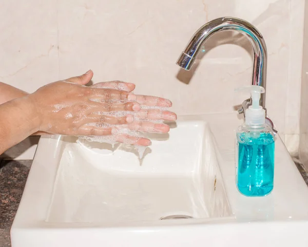 Hand Hygiene - Corona virus prevention, Cleaning Hands with Hand washing Soap. Protection by washing hands frequently